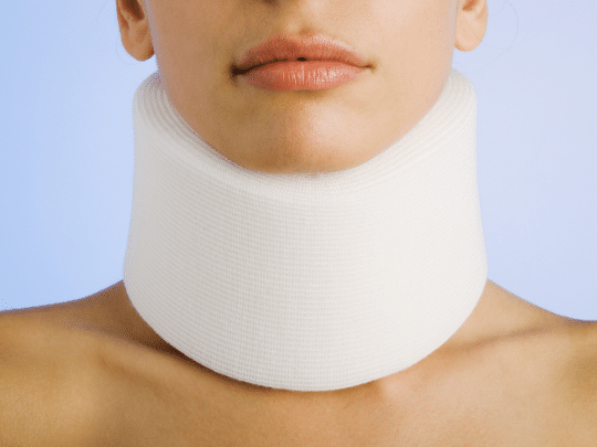 woman wearing a neck brace for Whiplash therapy in Altamonte Springs
